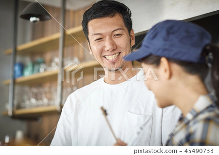 Staff working at a cafe 45490733
