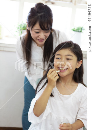 Girl making makeup 45494728