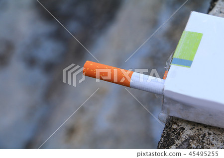 closeup cigarette in package on cement background 45495255