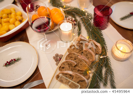 bread slices and other food on christmas table 45495964