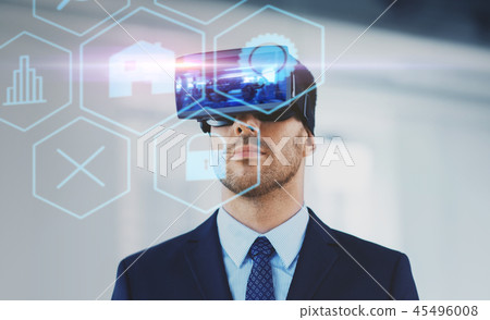 businessman with virtual reality headset at office businessman with virtual reality headset at office 45496008