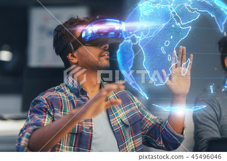 man in vr headset with earth hologram at office man in vr headset with earth hologram at office 45496046