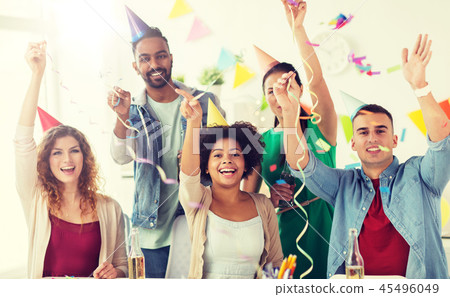 happy team with confetti at office birthday party happy team with confetti at office birthday party 45496049