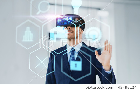 businessman with virtual reality headset at office businessman with virtual reality headset at office 45496124