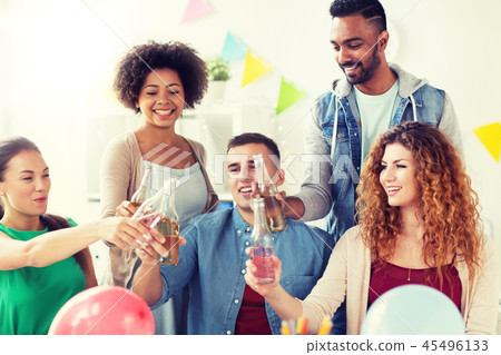 happy team with drinks celebrating at office party happy team with drinks celebrating at office party 45496133
