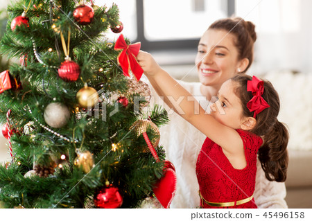Happy Family Decorating Christmas Tree At Home Stock Photo 45496158 Pixta - A Family By Decorating Christmas Tree At Home Happy Family Decorating Christmas Tree At Home Stock Photo 45496158 Pixta - A Family By Decorating Christmas Tree At Home