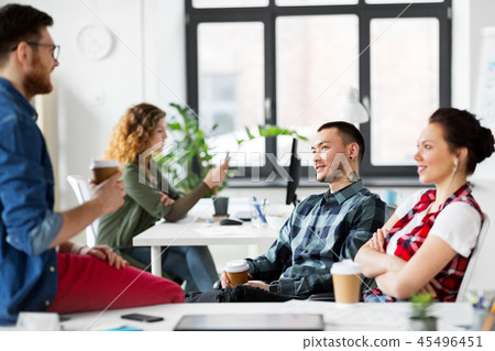 creative team drinking coffee at office creative team drinking coffee at office 45496451