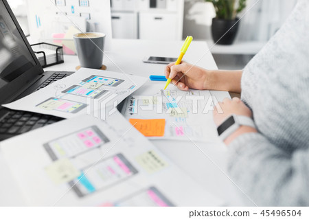 web designer working on user interface at office web designer working on user interface at office 45496504