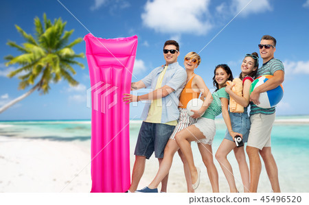 happy friends with beach and summer accessories 45496520