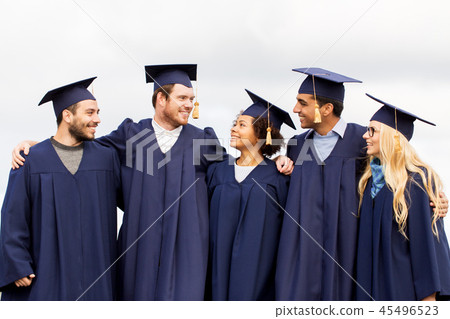 happy students or bachelors in mortar boards 45496523