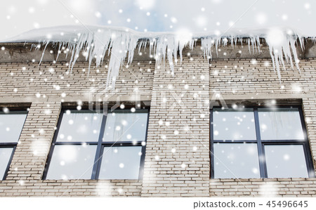 icicles on building or living house facade icicles on building or living house facade 45496645