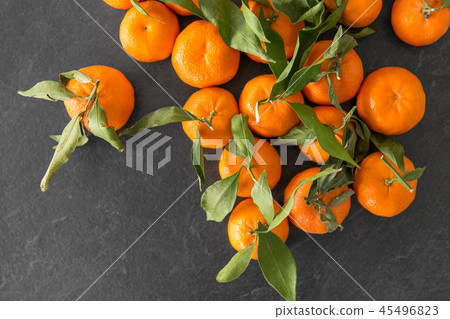close up of mandarins on slate table top close up of mandarins on slate table top 45496823