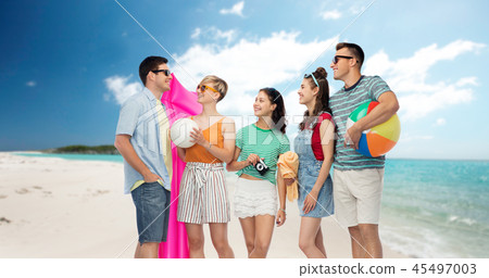 happy friends with beach and summer accessories 45497003