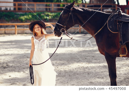 Girl with hourse 45497008