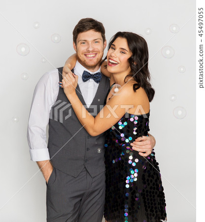 happy couple hugging in soap bubbles at party happy couple hugging in soap bubbles at party 45497055