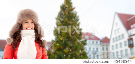 happy woman over christmas tree in tallinn happy woman over christmas tree in tallinn 45498544