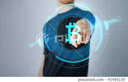 close up of man with bitcoin hologram close up of man with bitcoin hologram 45499139