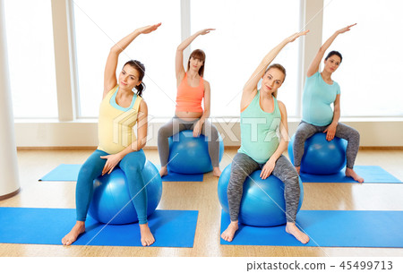pregnant women training with exercise balls in gym pregnant women training with exercise balls in gym 45499713