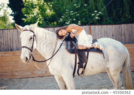 Girl with hourse 45500362