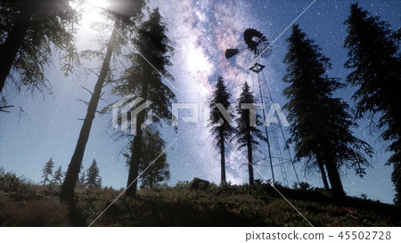 retro windmill in mountain forest with stars retro windmill in mountain forest with stars 45502728