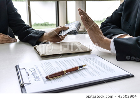 Businessman refuse receive bribe money the form of dollar bills 45502904