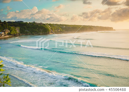 Tropical island and ocean with big waves and sky 45506488