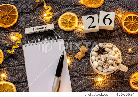 calendar January 26th Cup of cocoa and empty open notepad 45506654