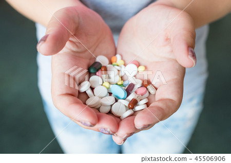pills capsule hands dosage drug administration pills capsule hands dosage drug administration 45506906