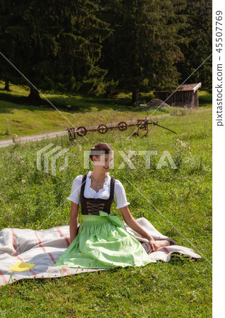 Young girl Bavarian traditional dressed. Young girl Bavarian traditional dressed. 45507769