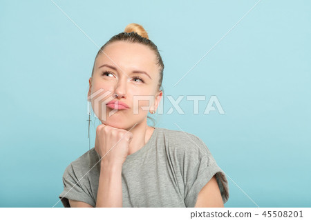 thoughtful woman pout duckface facial expression thoughtful woman pout duckface facial expression 45508201