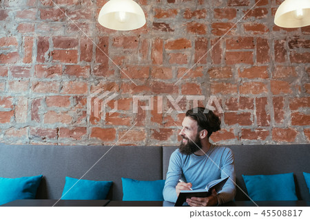 man writing notebook plan think idea visualization man writing notebook plan think idea visualization 45508817