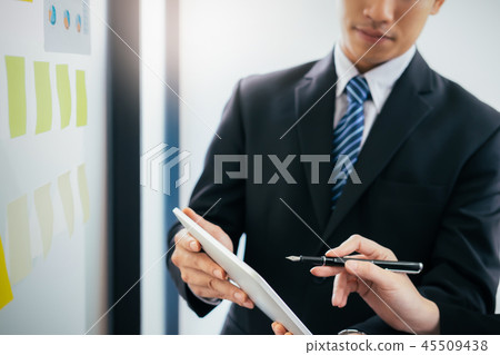 Businessmen meeting to discuss the investment. Businessmen meeting to discuss the investment. 45509438