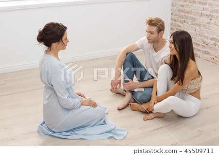 Young happy couple on reception for family psychologist Young happy couple on reception for family psychologist 45509711