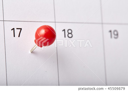 Red thumbtack tax day 201 45509879