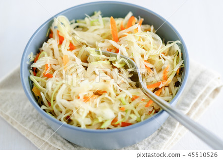 Bowl with sauerkraut and fork Bowl with sauerkraut and fork 45510526