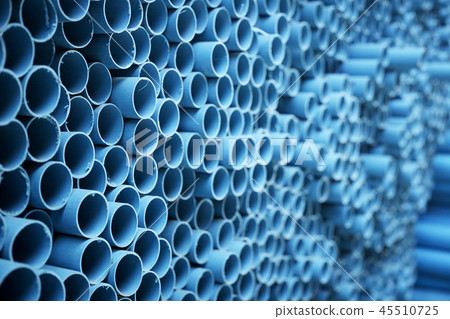 Blue PVC pipes stacked 45510725