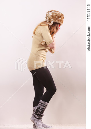 Beautiful winter woman in warm clothing 45511346