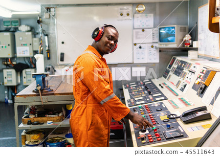 Marine engineer officer working in engine room Marine engineer officer working in engine room 45511643