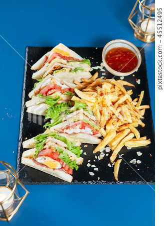 Tasty Sandwich on black stone in fancy restaurant Tasty Sandwich on black stone in fancy restaurant 45512495