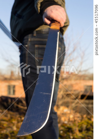 Blade machete in hand Blade machete in hand 45517096