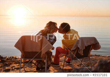 Young couple having a date at the sunset 45517101