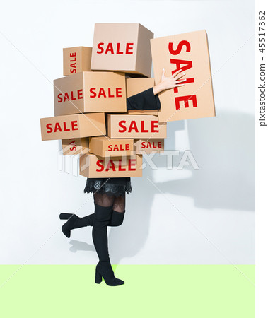 Gift boxes in the hands of young woman 45517362