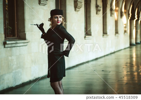 Retro woman on the train station Retro woman on the train station 45518309
