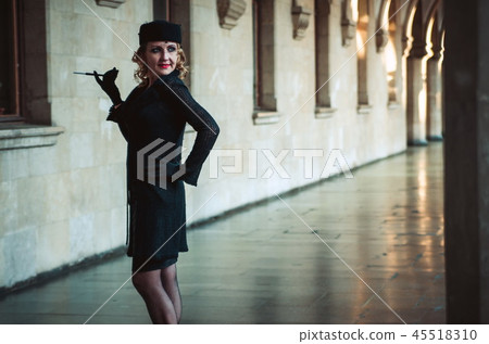 Retro woman on the train station Retro woman on the train station 45518310