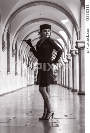 Retro woman on the train station Retro woman on the train station 45518311