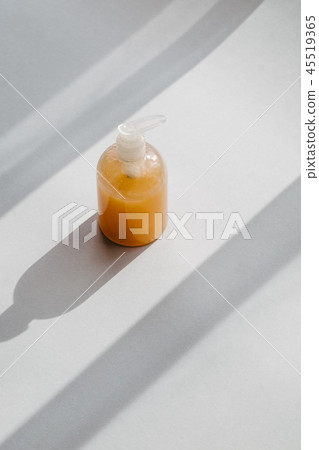 Clear plastic bottle with organic cosmetic 45519365