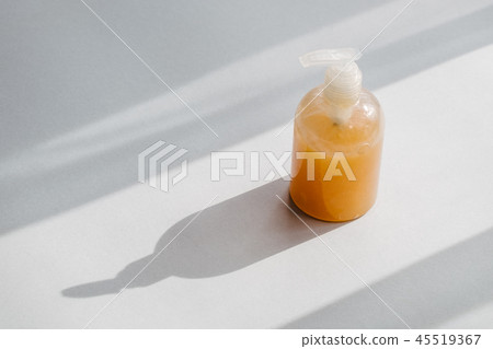 Clear plastic bottle with organic cosmetic Clear plastic bottle with organic cosmetic 45519367