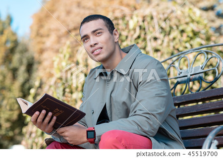 Dreamy Male Person Sitting On The Bench Stock Photo 45519700