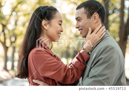Beautiful loving girl embracing her handsome boy 45519713