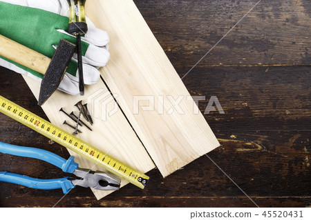 carpentry tools on wooden background 45520431